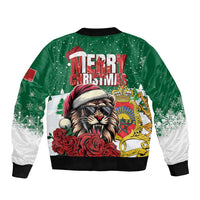 Green bomber jacket with Santa lion graphic, Merry Christmas lettering, and white snowflake print