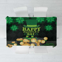 Green St Patrick’s Day tablecloth with shamrocks, coins, and “Happy St Patrick’s Day” text
