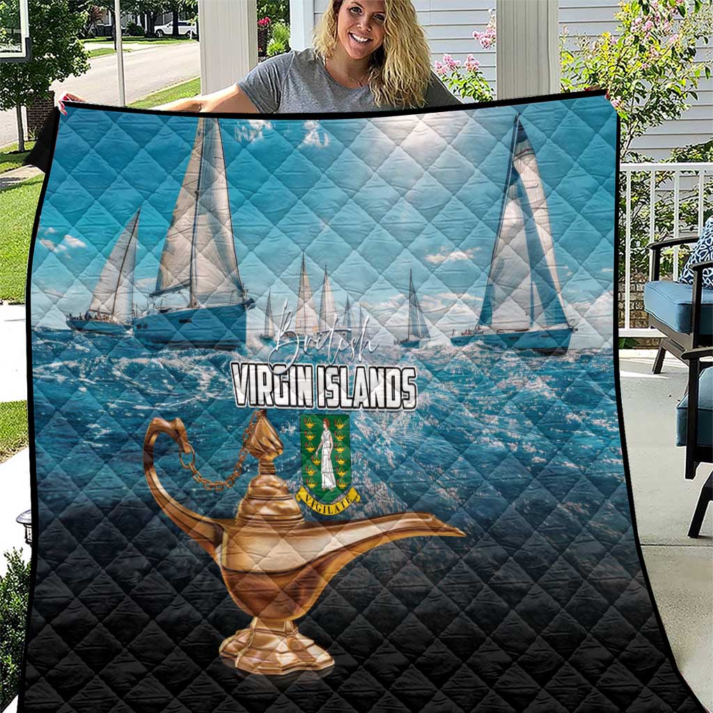 Blue and black quilt with sailboats and Virgin Islands text, gold lamp graphic in center