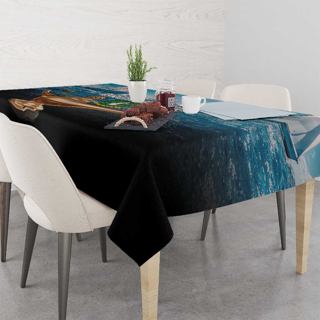 British Virgin Islands tablecloth with blue waterfront print and black draped edge on table