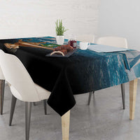 British Virgin Islands tablecloth with blue waterfront print and black draped edge on table