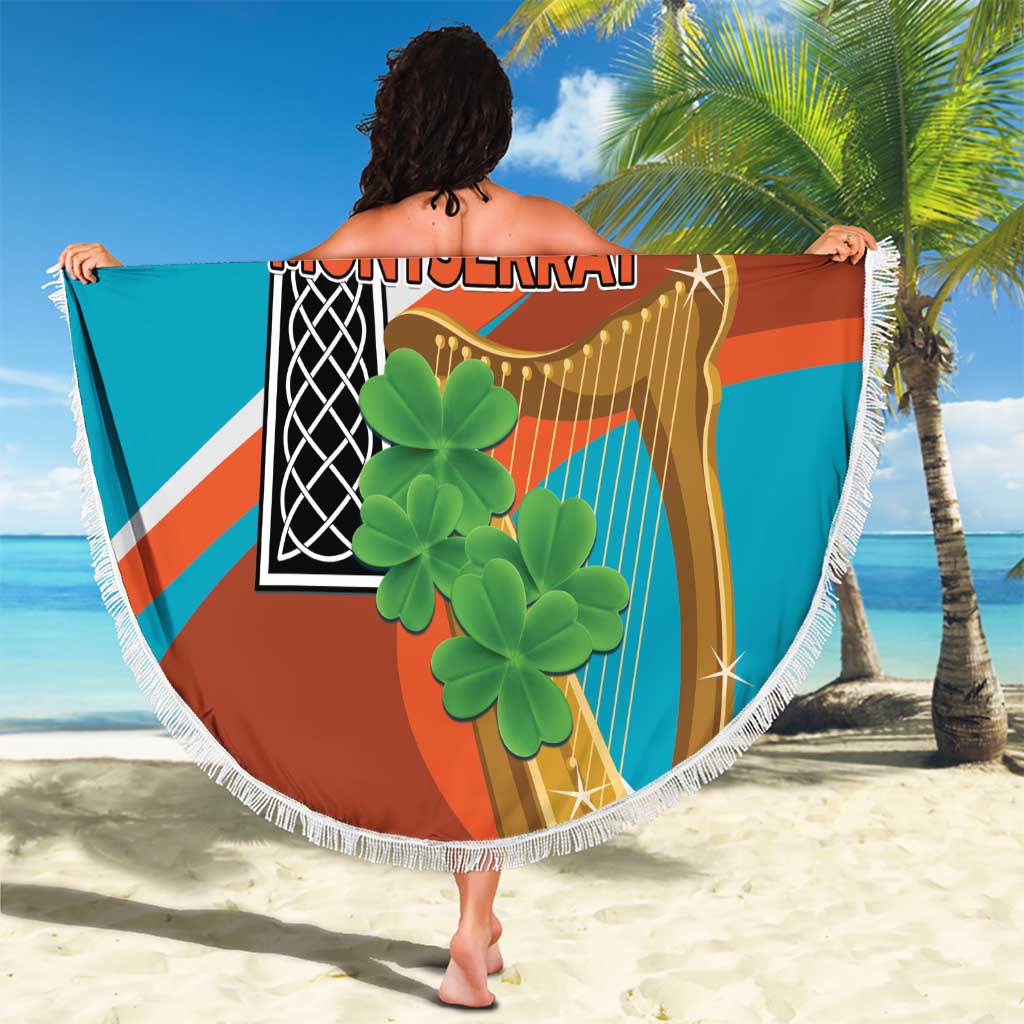 Round beach blanket with white fringe, orange teal cross design held outdoors on sand