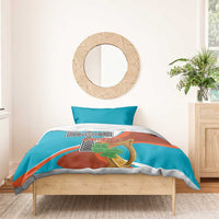 Bedding set with teal duvet cover, cross and harp design, and two teal pillowcases