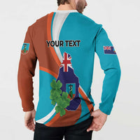 Back view teal and rust button sweatshirt with Your Text, Montserrat map and flag patch.