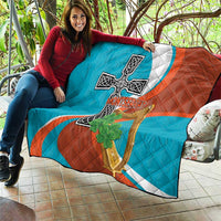 Quilted throw blanket with Montserrat flag cross-and-harp graphic and green shamrock decoration