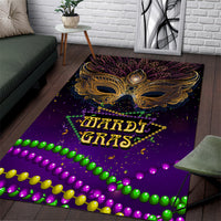 Purple carnival area rug with gold mask, Mardi Gras lettering, and colorful bead border