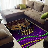 Purple Mardi Gras area rug with ornate gold mask, Mardi Gras wording, and bead trim
