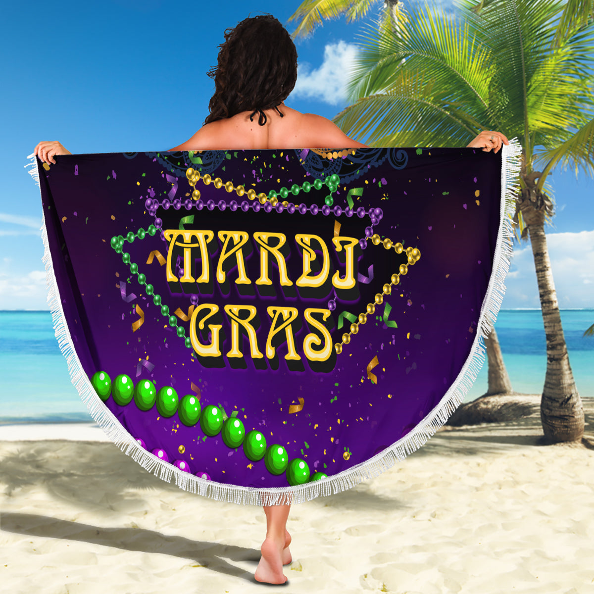 Purple round beach blanket with gold carnival mask graphic, bead accents, white fringe trim