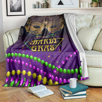 Purple Mardi Gras carnival mask blanket with gold feather design and colorful bead trim
