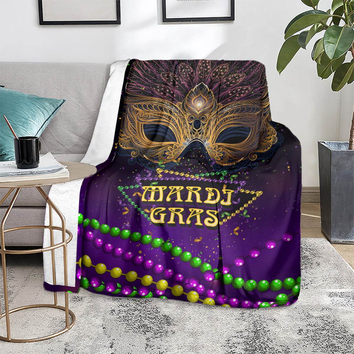 Purple Mardi Gras carnival mask blanket with gold mask emblem and bright green, pink bead trim