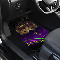 Purple car floor mat with gold mask artwork, star shapes, and green/pink bead trim plus 'YOUR TEXT'.