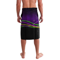 Purple and black carnival lavalava with green bead border and sparkly speckle
