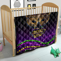 Purple quilt in a nursery with gold bird mask design and multicolor Mardi Gras bead stripes