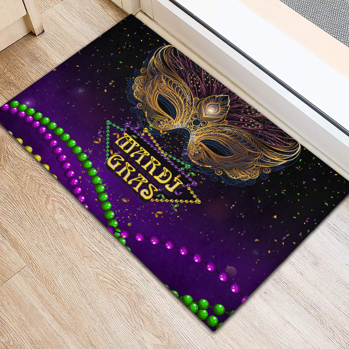 Purple carnival doormat with gold feather mask, HARDI GRAS lettering, multicolor bead trim