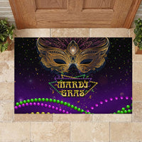 Purple carnival doormat with gold feather mask, HARDI GRAS text, green and purple bead border