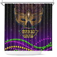 Purple Mardi Gras shower curtain with golden feather mask and colorful bead trim at bottom
