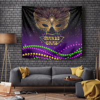 Purple carnival mask wall tapestry with Mardi Gras text and green, pink, gold bead garlands