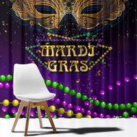 Mardi Gras window curtain showing ornate gold carnival mask, purple base, and bead garland