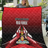 Red and black quilt with diamond stitching and Trinidad and Tobago Red Force emblem