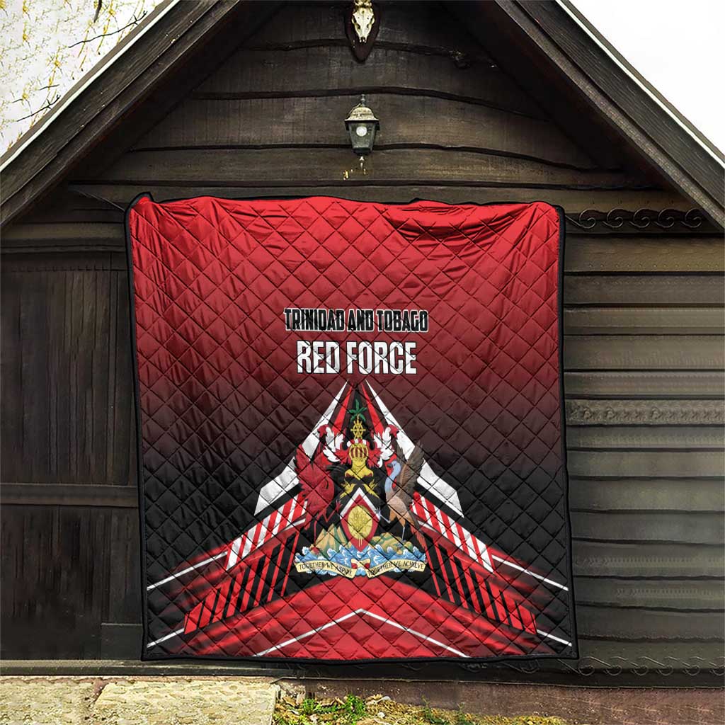 Red and black quilt hanging in doorway, Trinidad and Tobago Red Force logo