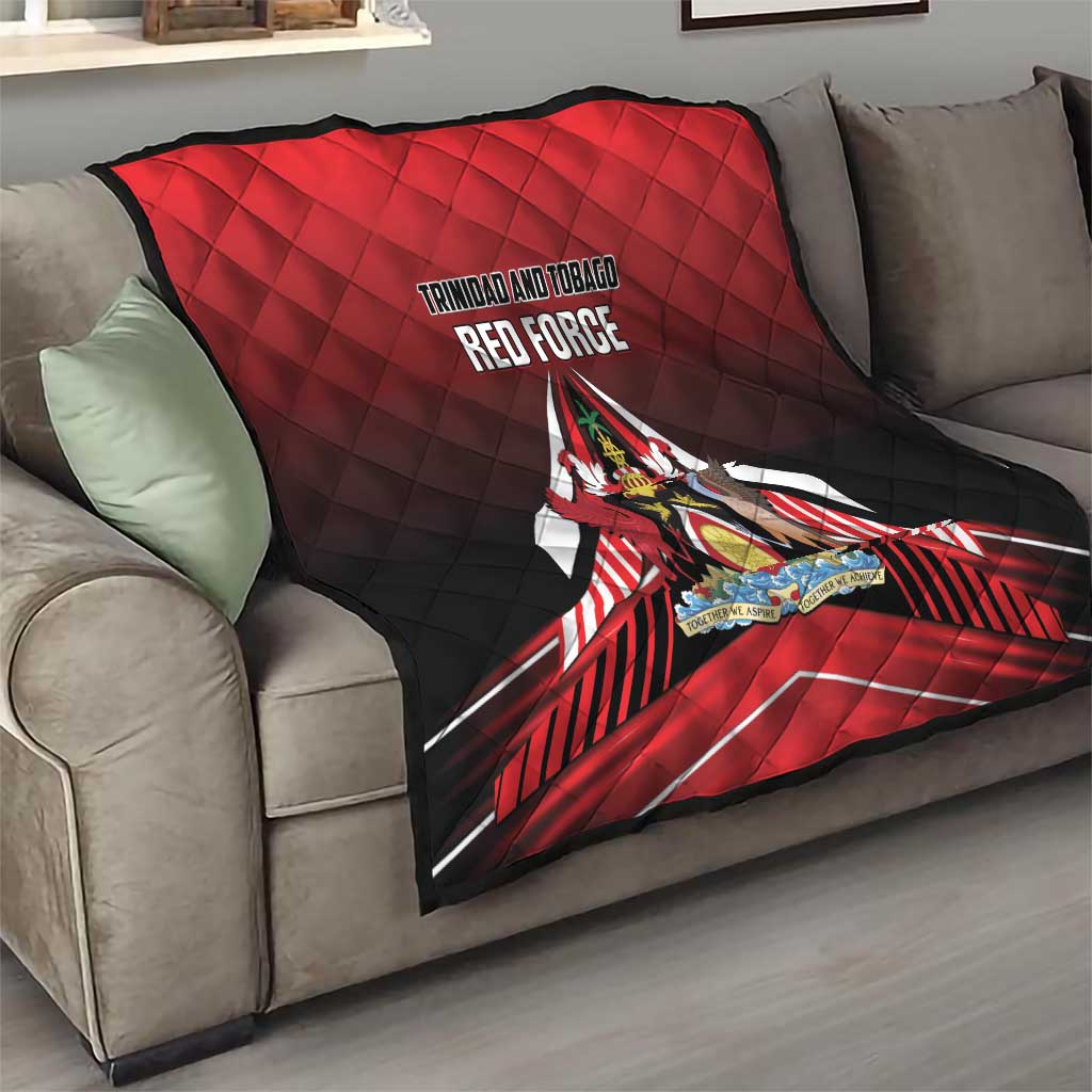 Red and black quilt on living-room sofa with Trinidad and Tobago Red Force emblem