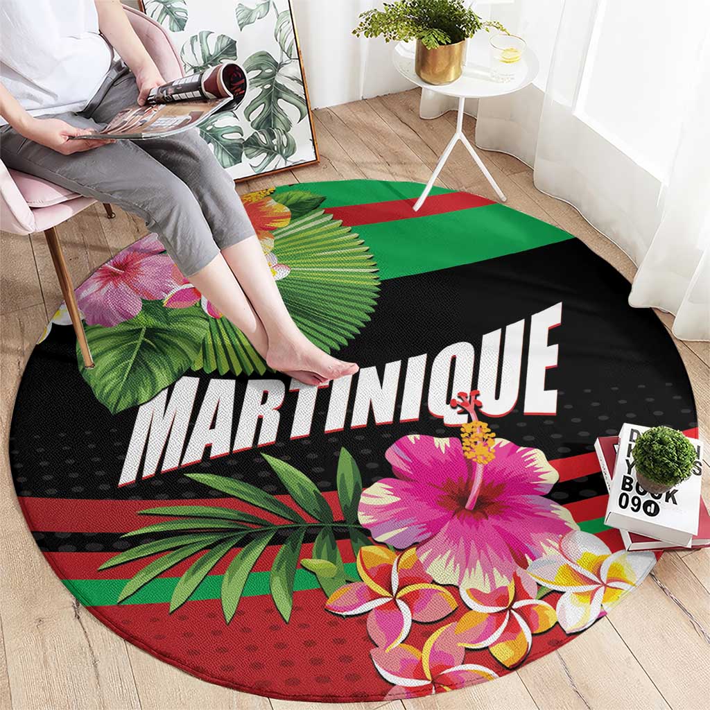 Round black carpet mat featuring MARTINIQUE lettering with colorful tropical floral design