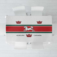 White tablecloth with red-and-green border, crown and horse graphics