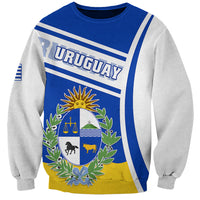 Unisex sweatshirt with blue front, white stripes, and Uruguay crest graphic, gray sleeves