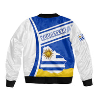 Blue and white bomber jacket, 'YOUR TEXT' back graphic with Uruguay map and sun