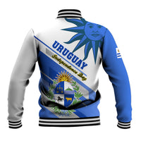 Unisex blue and white baseball jacket with Uruguay flag emblem and solar star graphic, ribbed cuffs