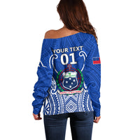 Blue off-shoulder rugby sweater with Aztec patterns and Samoa crest back print