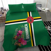 Green duvet and pillow set with tropical flower panel, Dominica text, and stripe accents