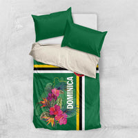 Green bedding set with tropical flowers, Dominica lettering, and yellow-white-black stripe