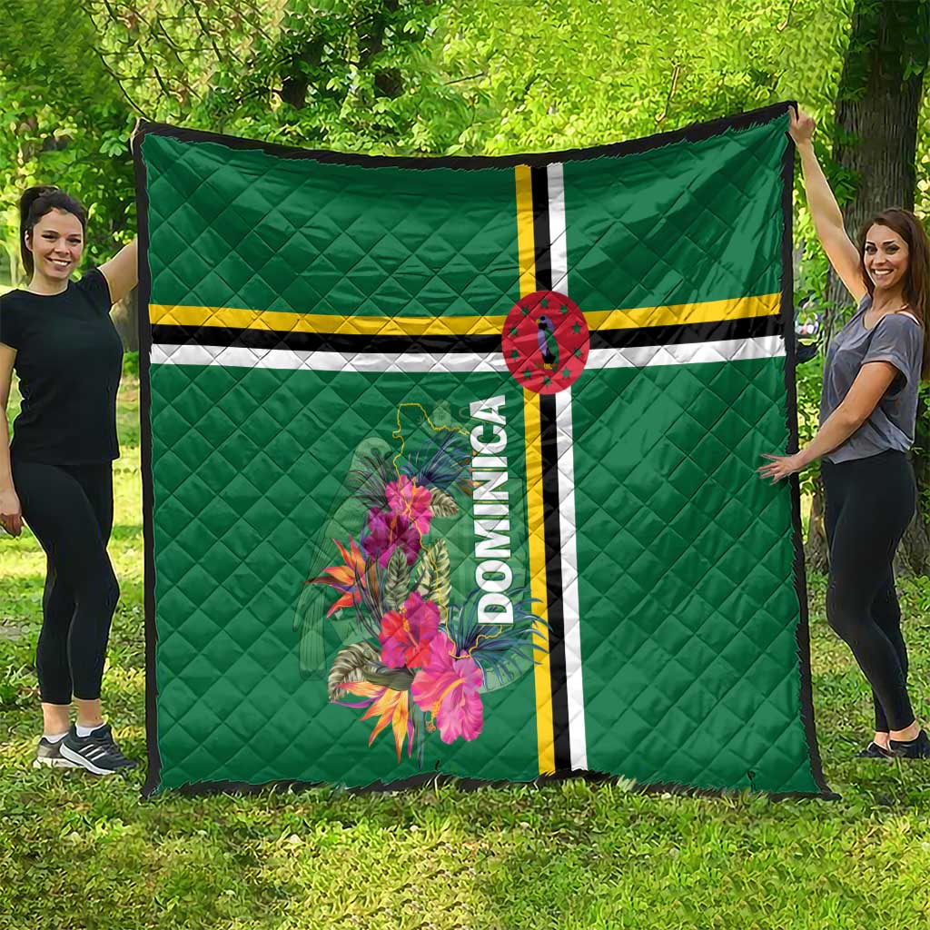 Green tropical quilt with floral center, striped bands, oval emblem, and Dominica text, large