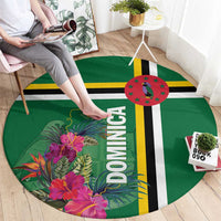 Round green tropical flower area rug with “DOMINICA” text and central stripe