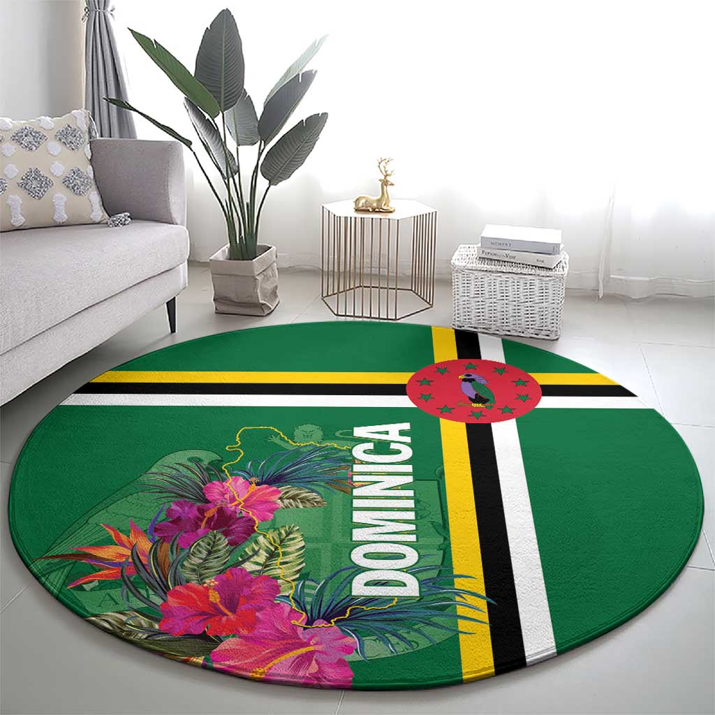 Round green tropical flower rug with “DOMINICA” and yellow-black-white stripe