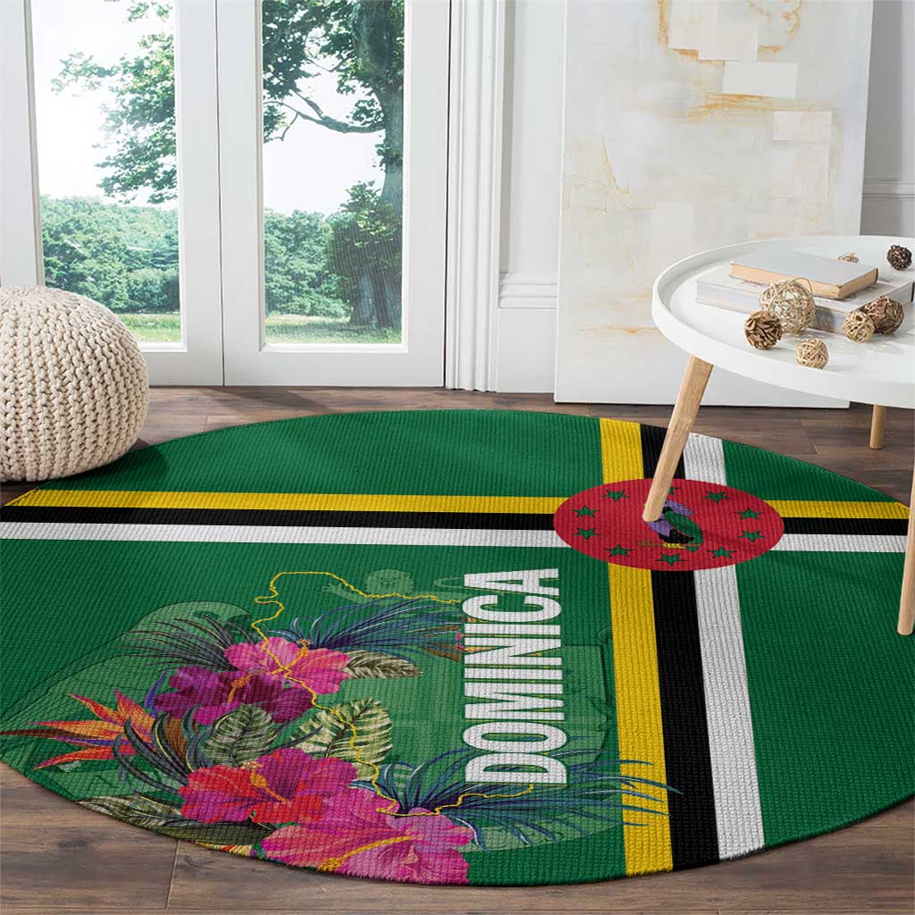 Round green tropical flower rug with “DOMINICA” lettering and black-yellow stripe