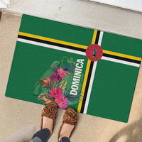 Green rubber doormat with tropical flower graphic, yellow/black stripes, and circular emblem