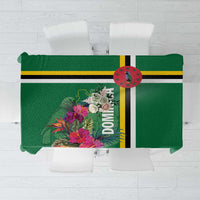 Green tablecloth top view with tropical flowers and black-yellow stripe panel.