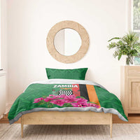 Green duvet bedding set with pink flowers and central flag-style graphic with orange stripe