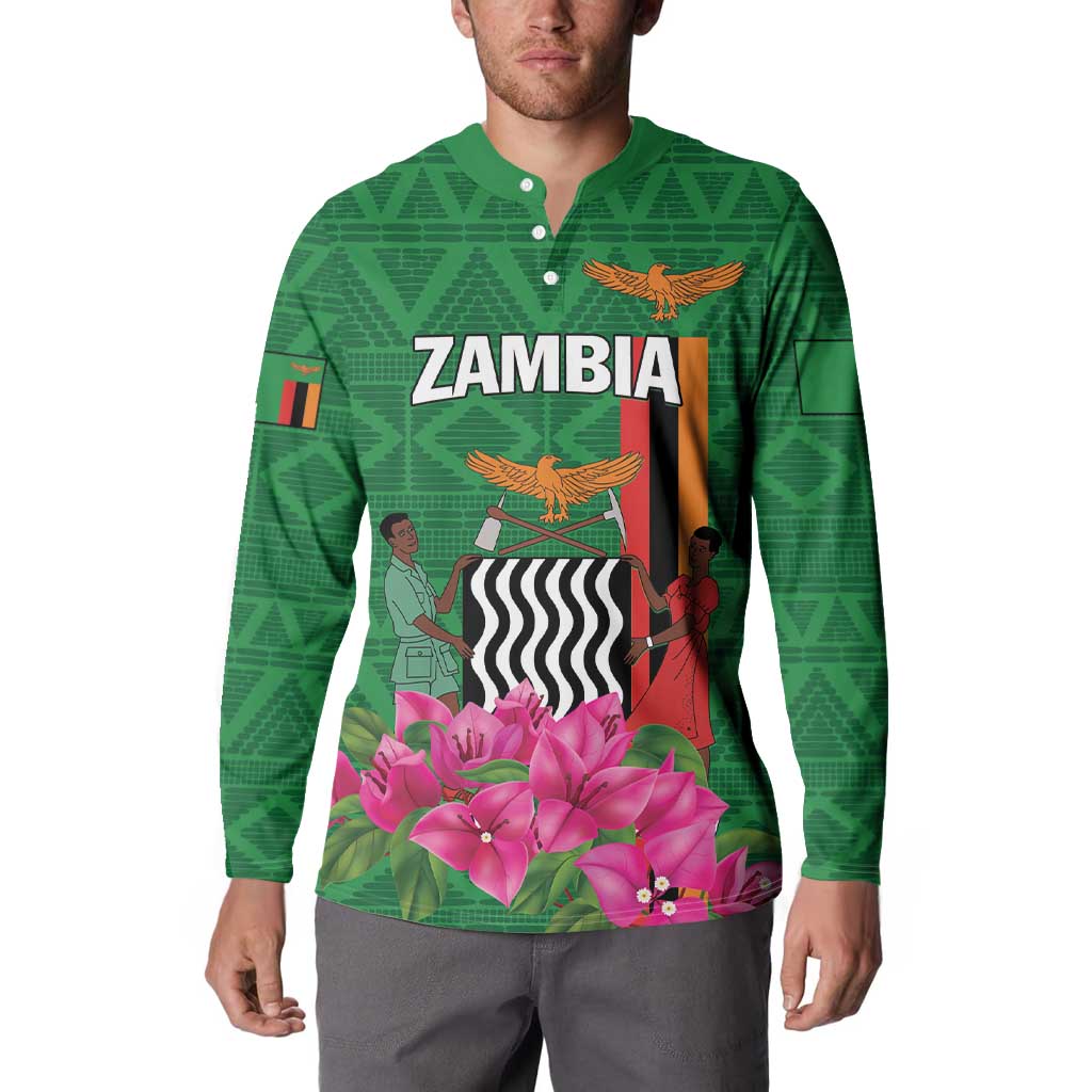 Green button-front sweatshirt, front print with 'ZAMBIA' and pink flower artwork, long sleeves