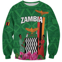 Unisex green Zambia sweatshirt with eagle graphic, people, flowers, and 'ZAMBIA' text