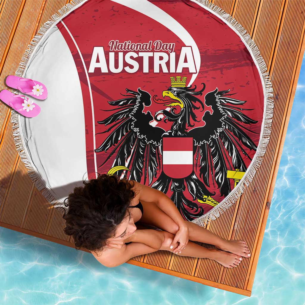 Round fringed beach blanket with Austria eagle graphic in red and white