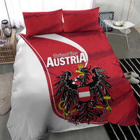 Red and white bed comforter set with Austria crest graphic and two matching pillow shams