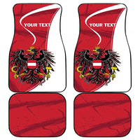 Car floor mat set with Austrian eagle design, red textured background, white border