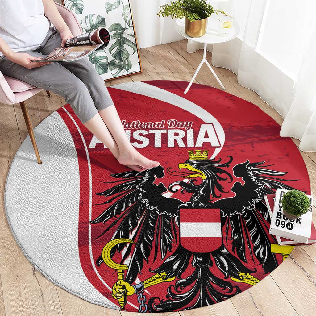 Round red rug featuring Austria National Day lettering and black eagle emblem