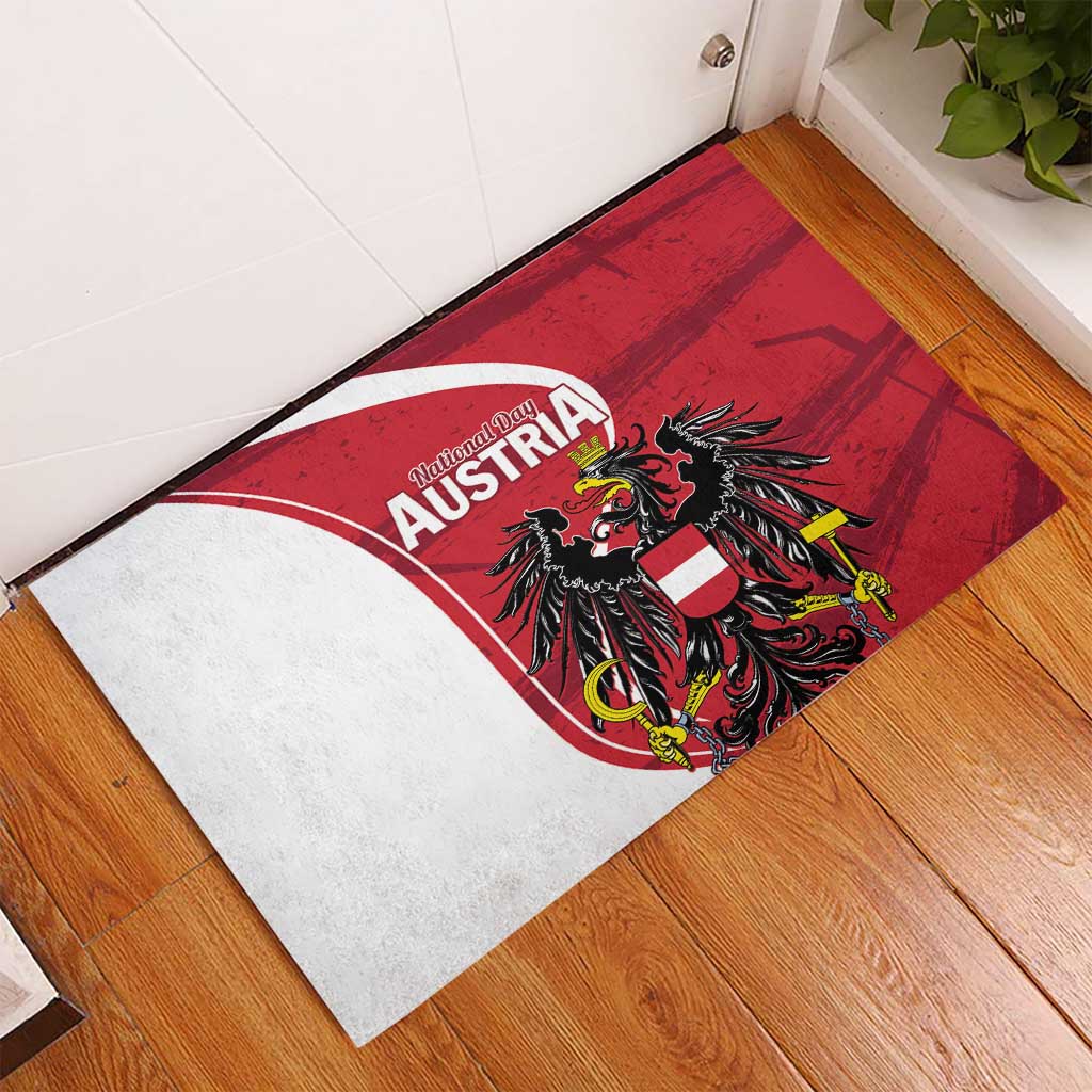 Red rectangular rubber doormat featuring Austria eagle crest and white curved stripe
