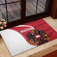 Red rubber doormat with Austria eagle crest and white arc stripe