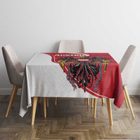Red Austria tablecloth with black eagle motif and ornate border on table