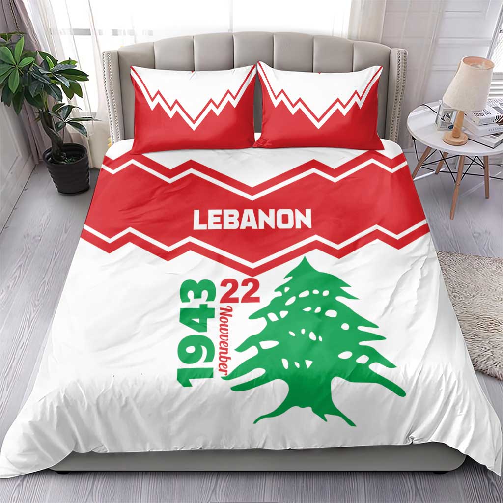Red and white duvet and pillow set with LEbanon lettering, green cedar tree, and zigzag border